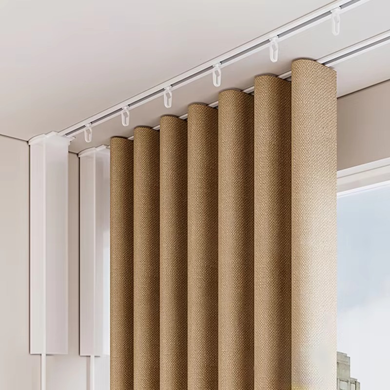 Smart motorized curtain track system with beige curtains and automated control