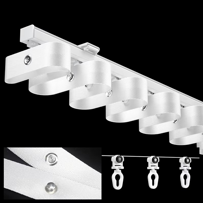 White wave fold curtain tape installed on track showing ripple fold mechanism with hooks