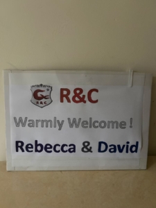R&C company welcome sign at airport for Rebecca and David from Ghana