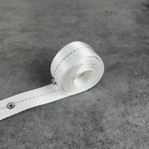 Partially unrolled white ripple fold curtain tape on spool showing grommet placement and construction
